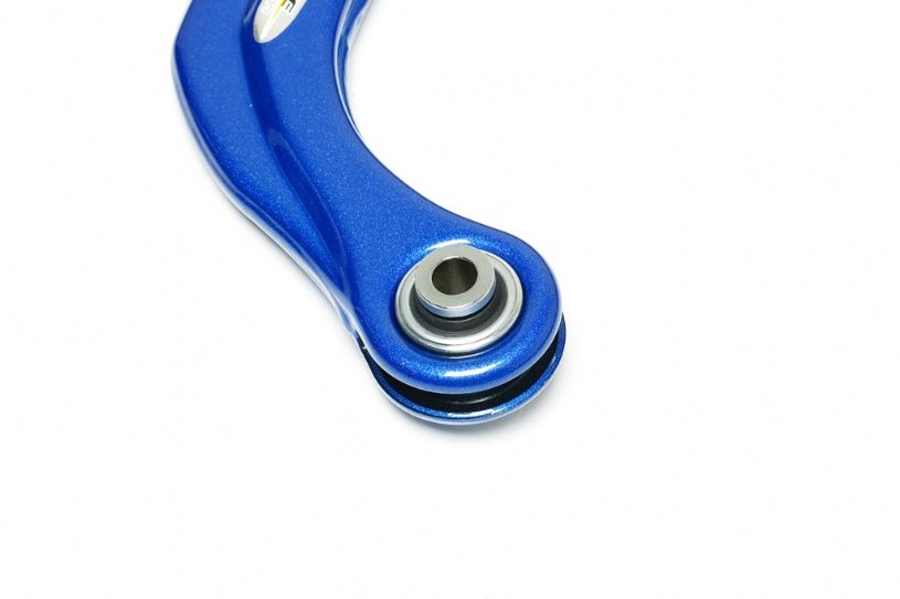 Blue metal control arm with a silver ball joint on a white background