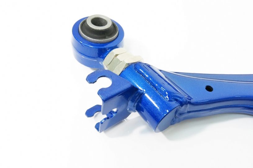 Blue metal control arm with a white background