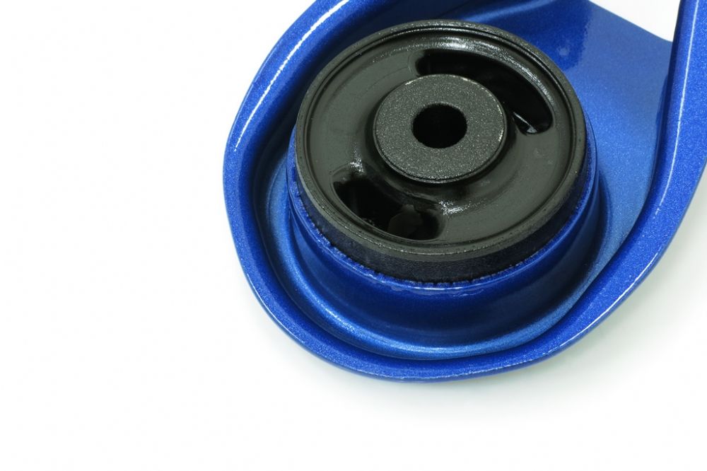 Close-up of a blue and black mechanical component on a white background